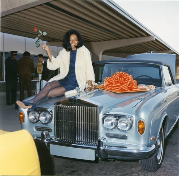 Diana Ross sat on top of her gifted Rolls Royce Silver Shadow Drophead Coupe