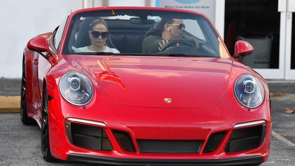Jennifer Lopez in her red Porsche Carrera 911 GTS