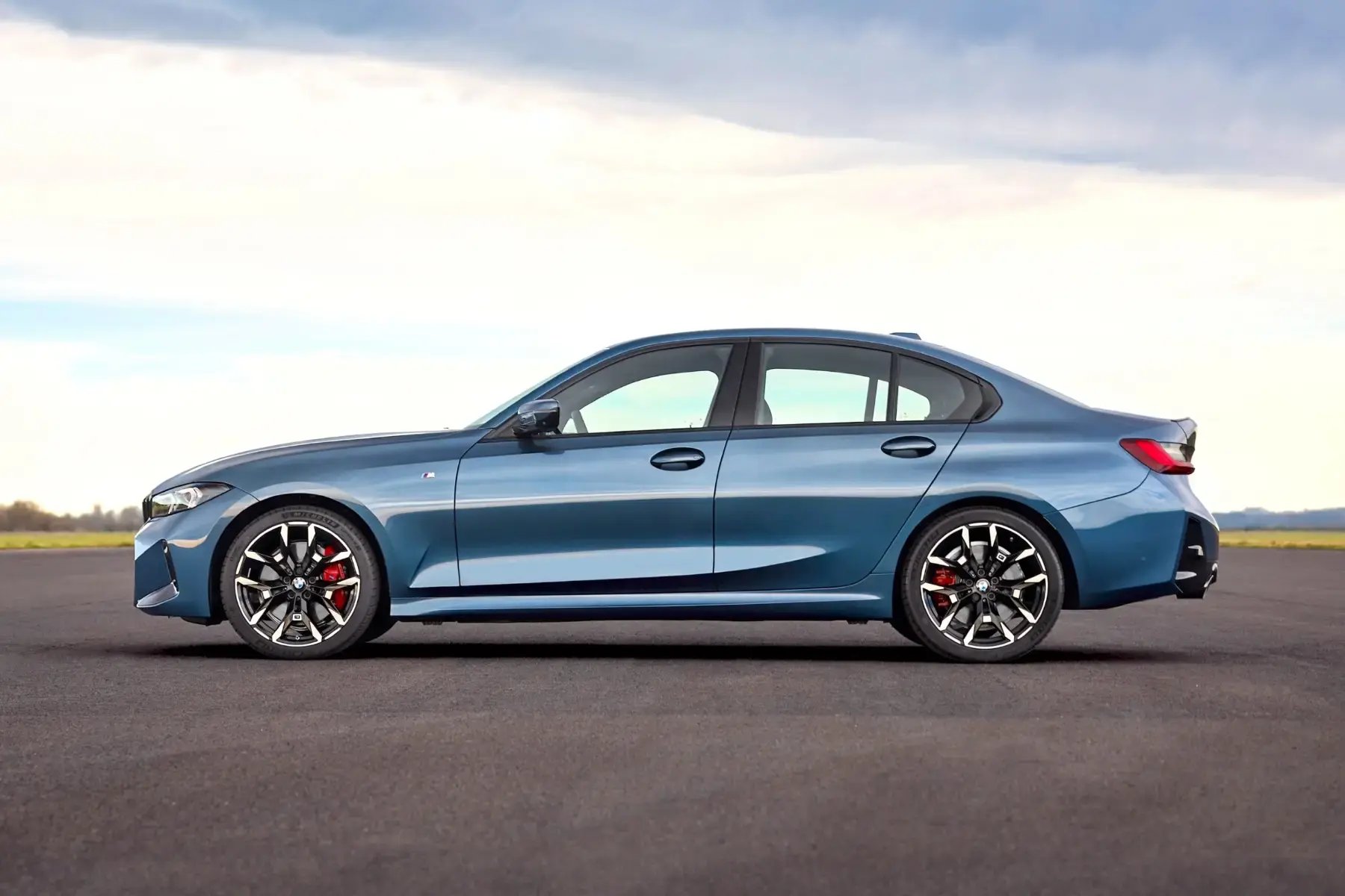 blue-BMW-3-Series-side-parked