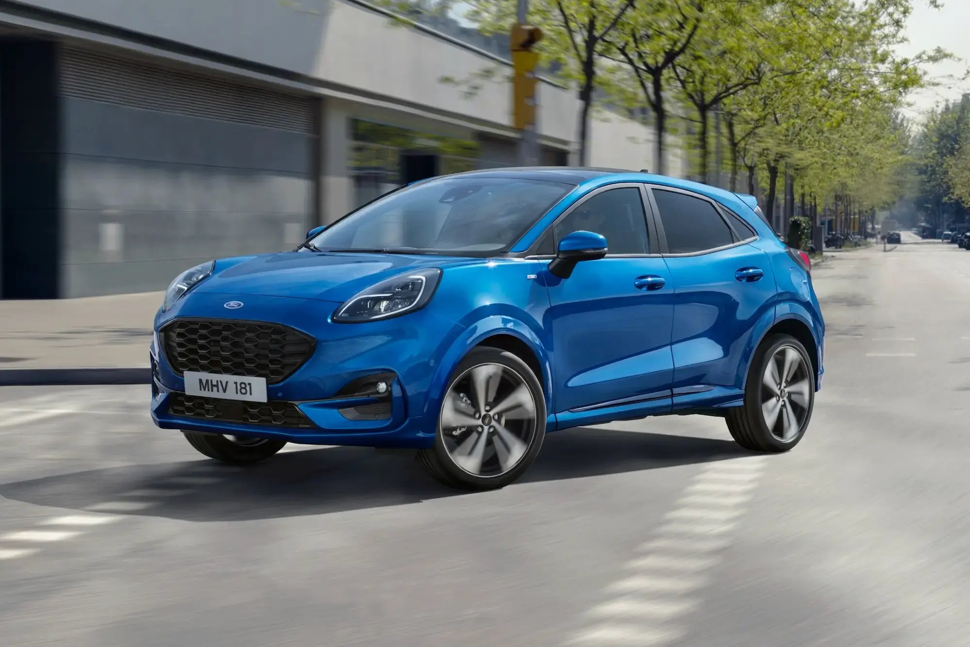 blue-Ford-Puma-parked-side