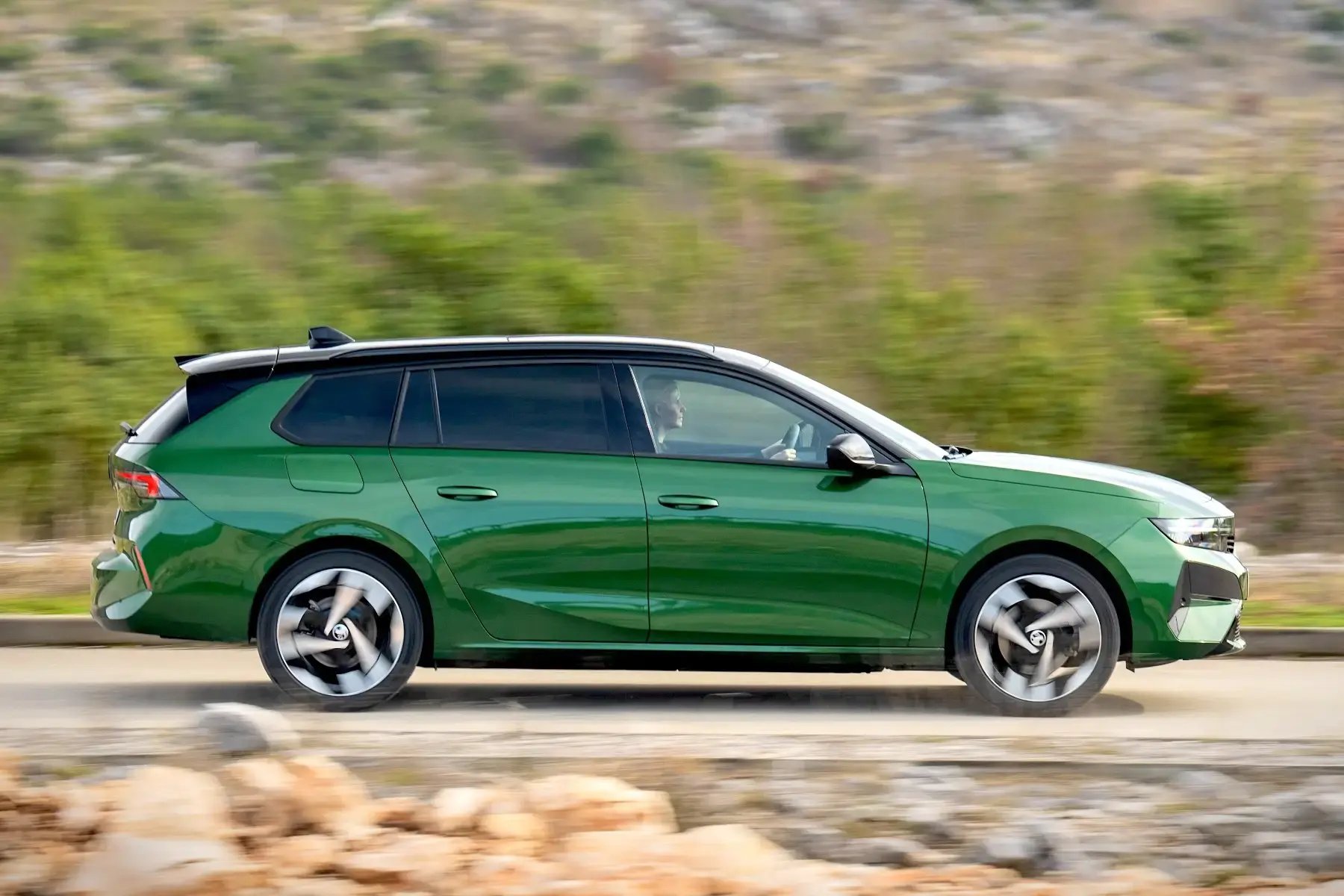 green-Vauxhall-Astra-Sports-Tourer-side