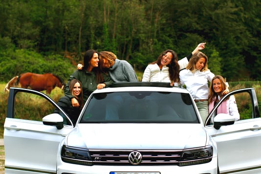 Happy family with new car