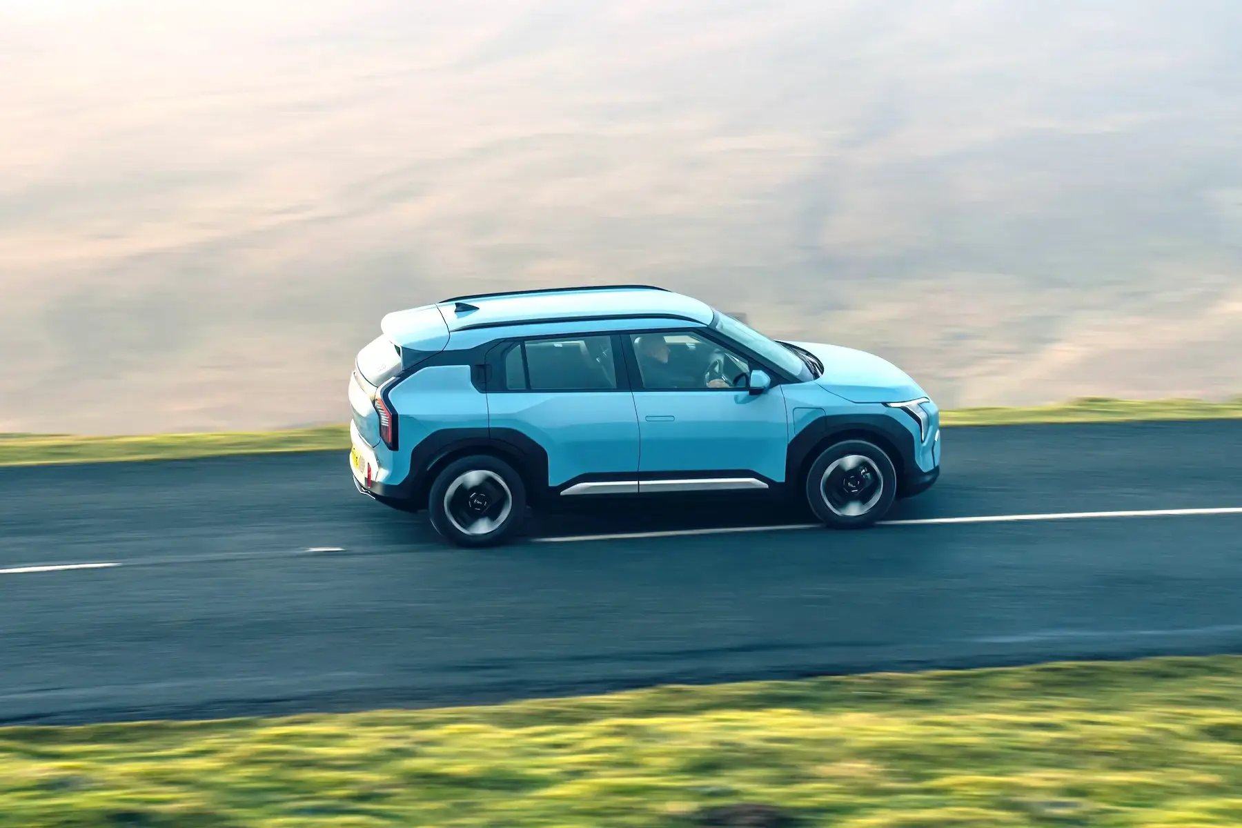 light-blue-Kia-EV4-dynamic-side