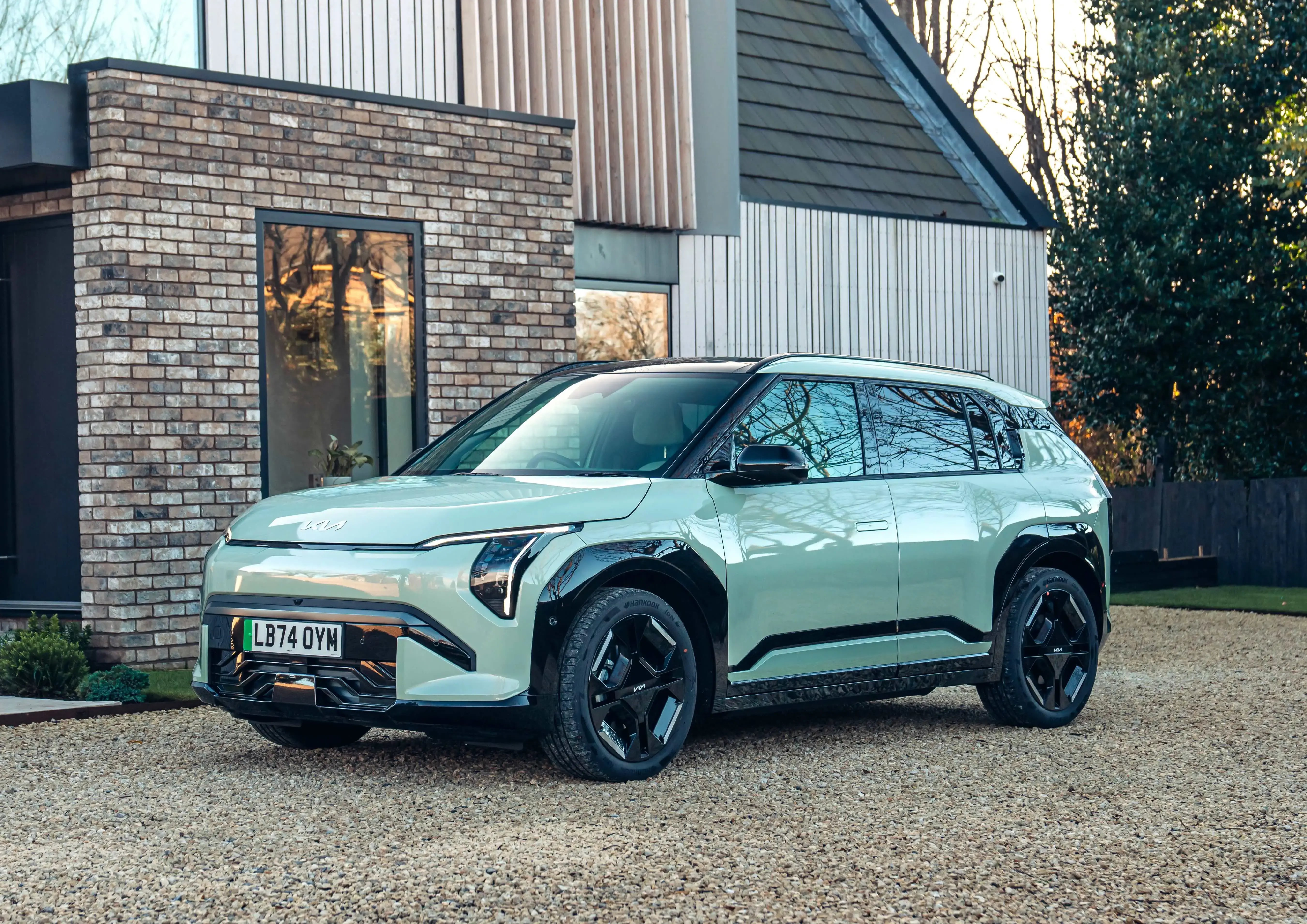 light-green-Kia-EV3-parked