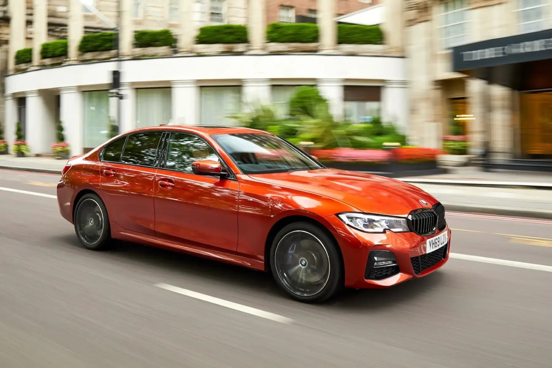 orange-BMW-3-Series-dynamic-side