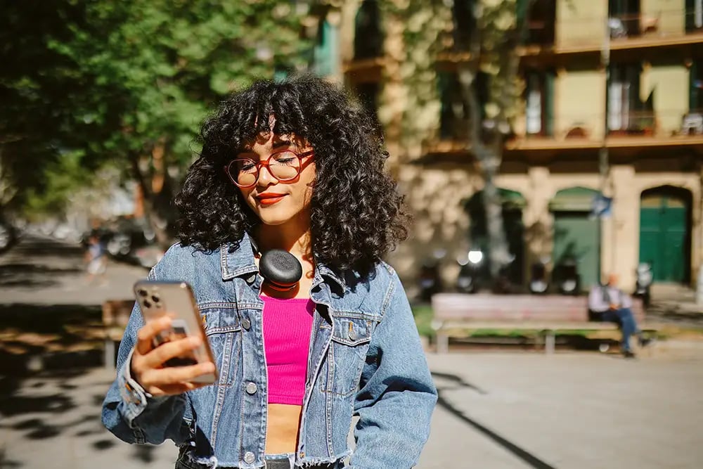 person looking at car finance app