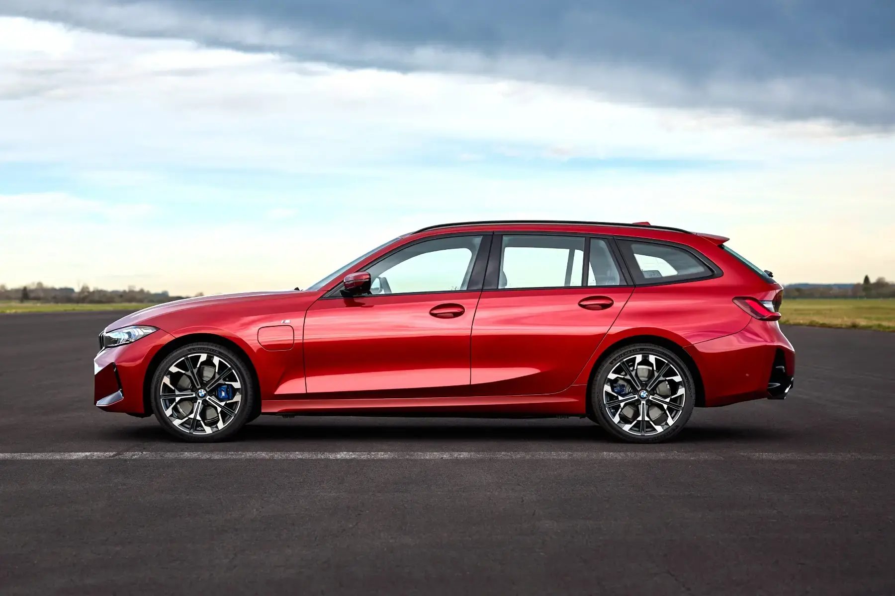 red-BMW-3-Series-parked-side