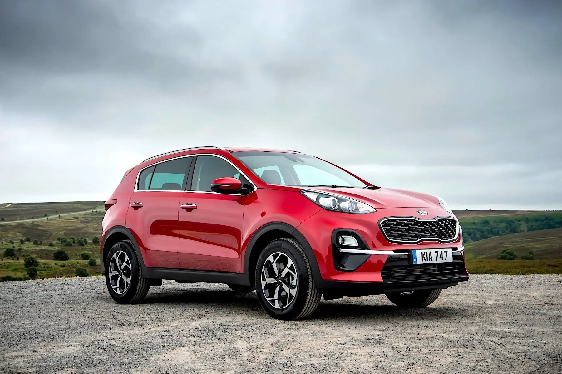 red-Kia-Sportage-parked