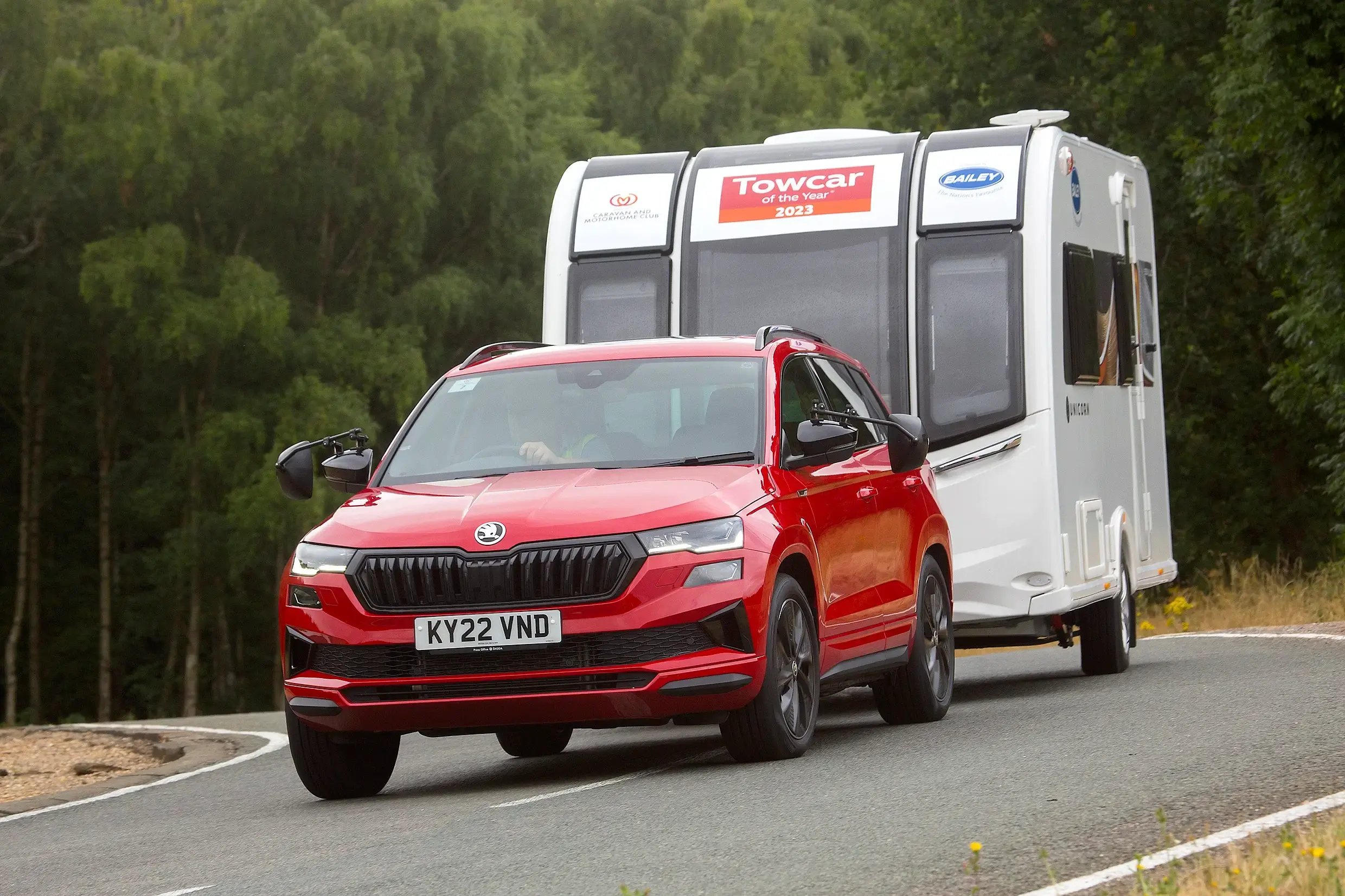 red-Skoda-Karoq-dynamic-front-with-camper