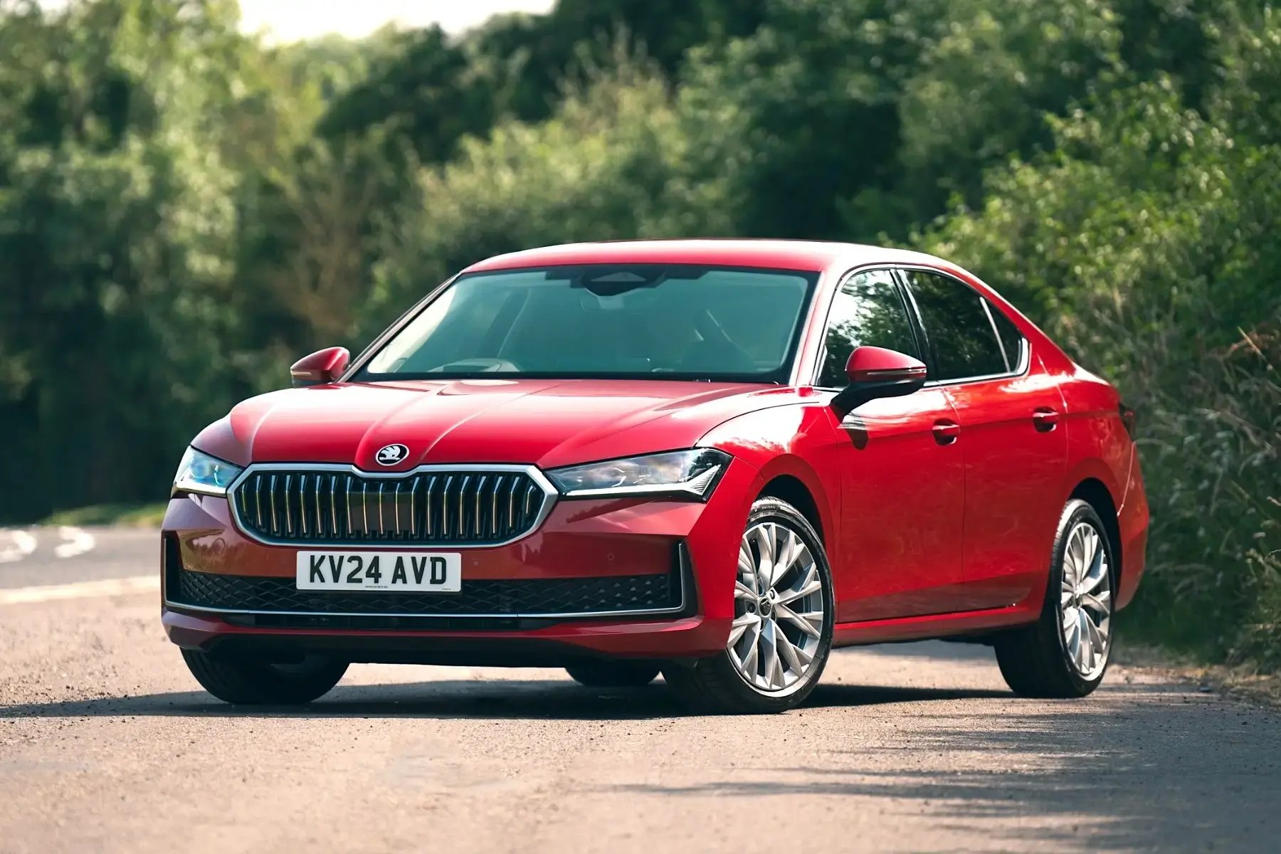 red-Skoda-Superb-parked-front