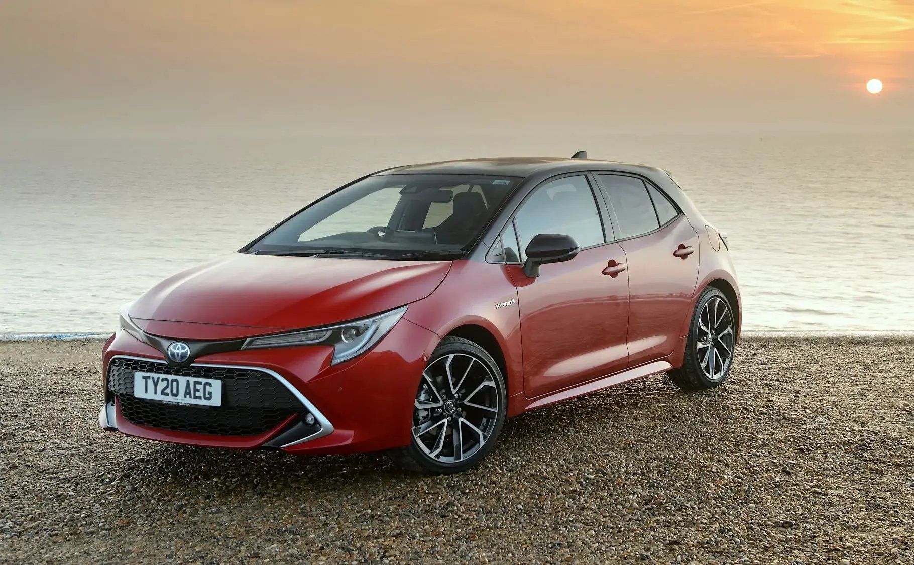 red-Toyota-Corolla-parked-front