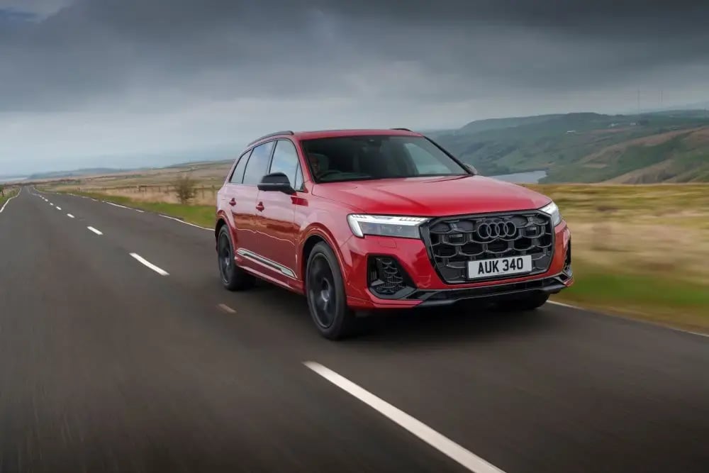 red-audi-q7-front-dynamic-country-road