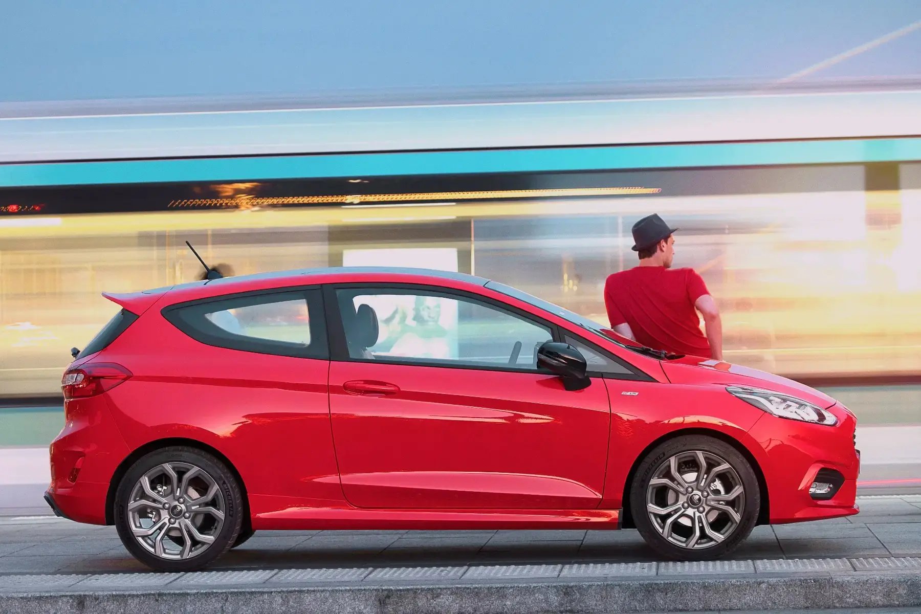 red-ford-fiesta-parked-side