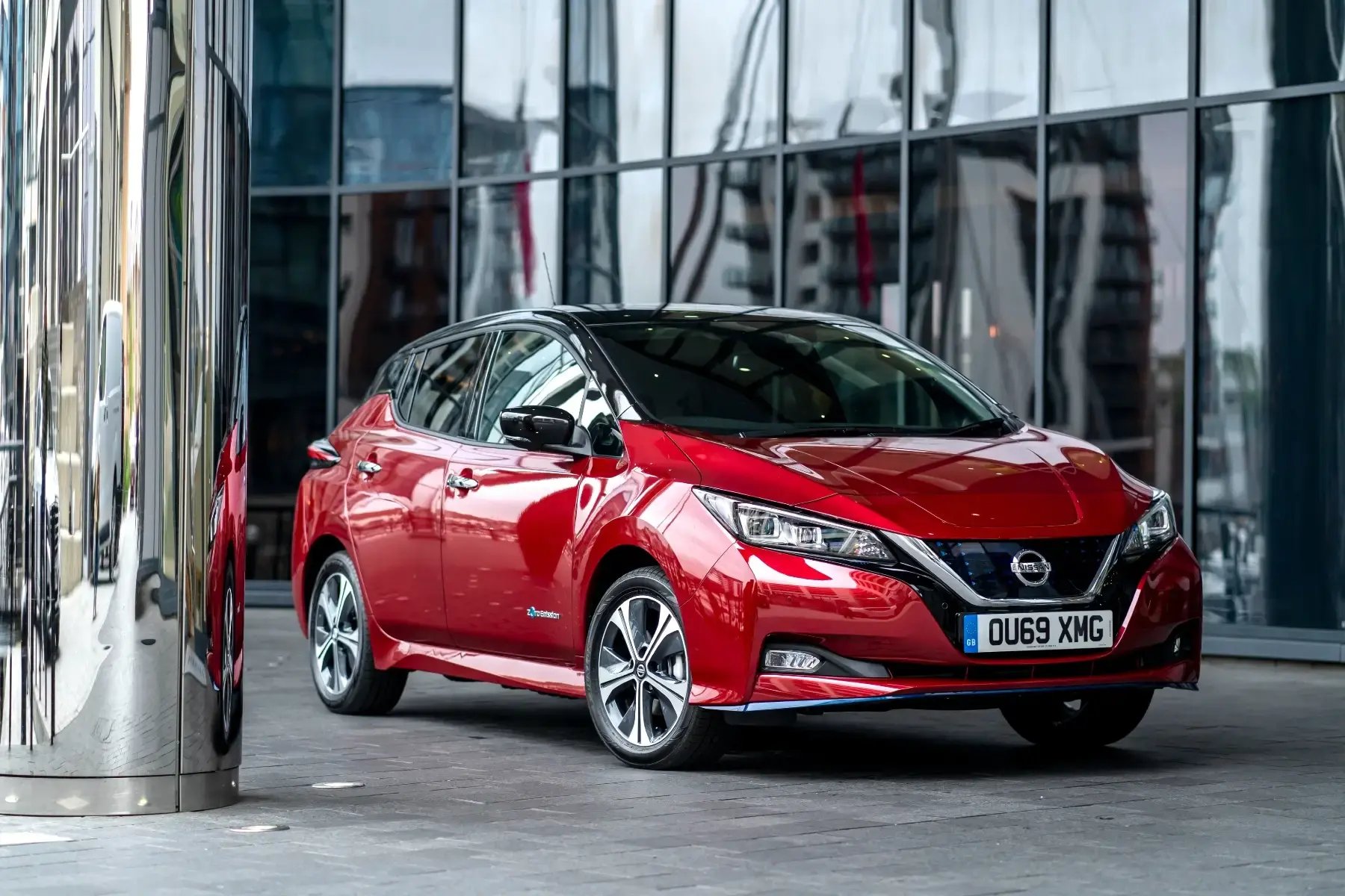 red-nissan-leaf-parked