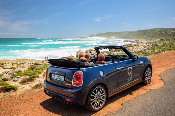 Blue Mini Convertible at the beach