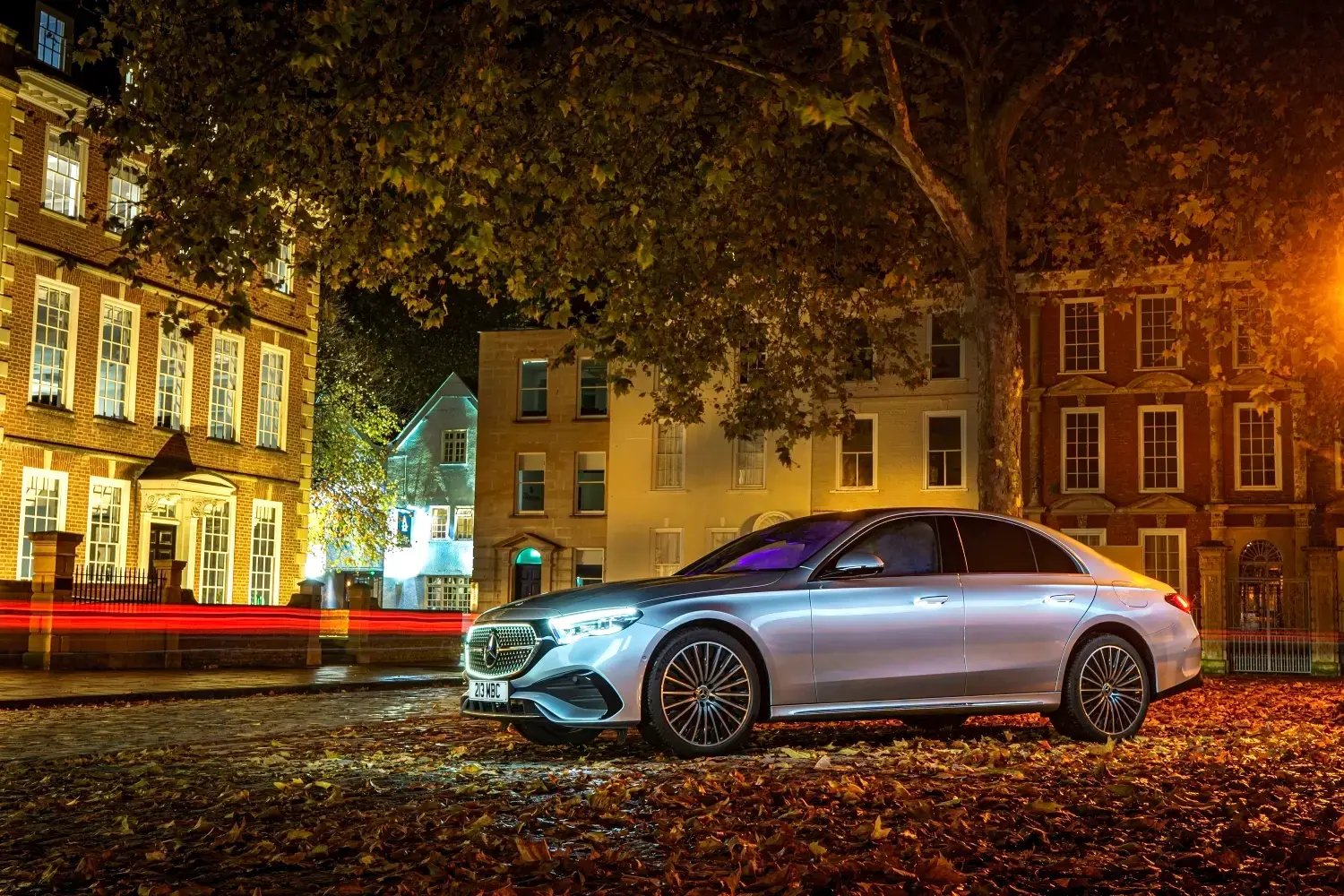 silver-Mercedes-Benz-E-Class-Saloon-parked