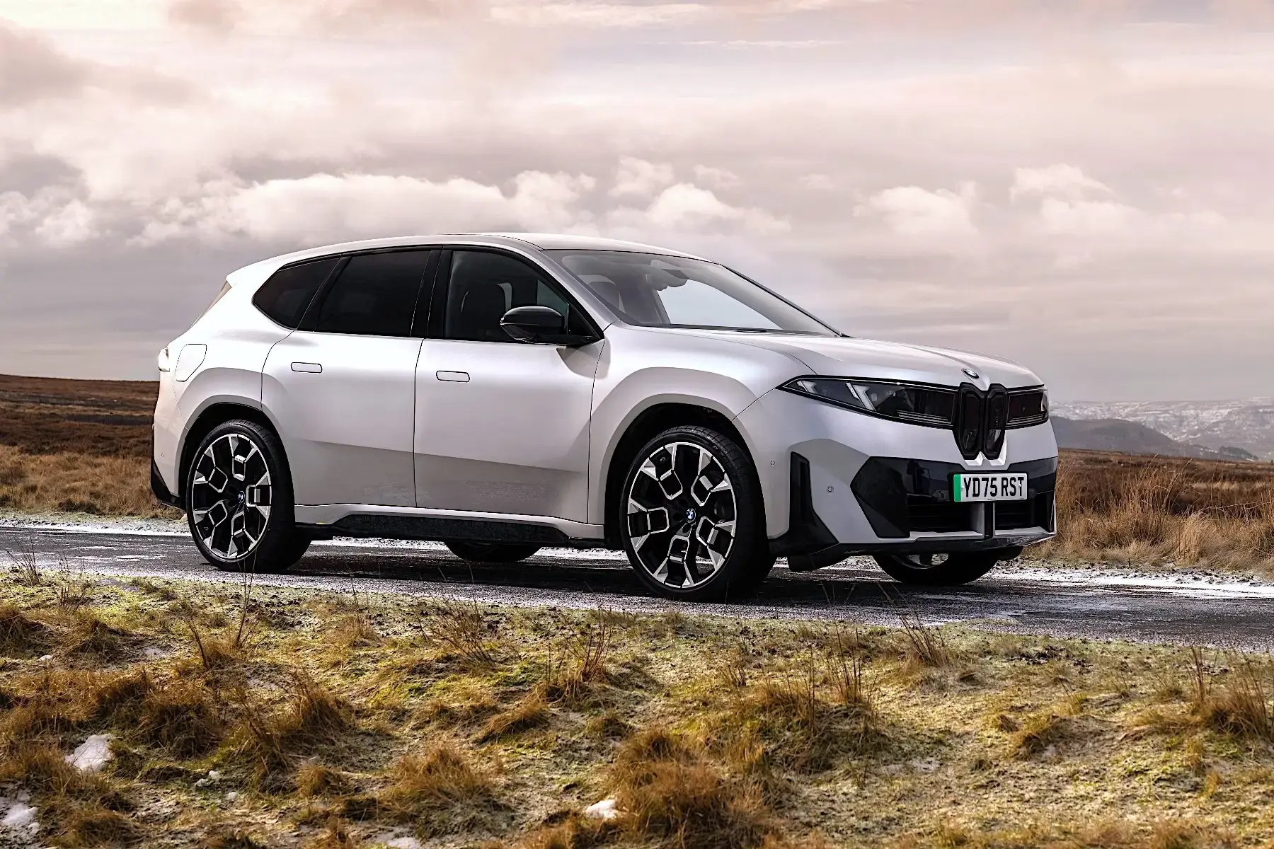 white-BMW-iX3-parked