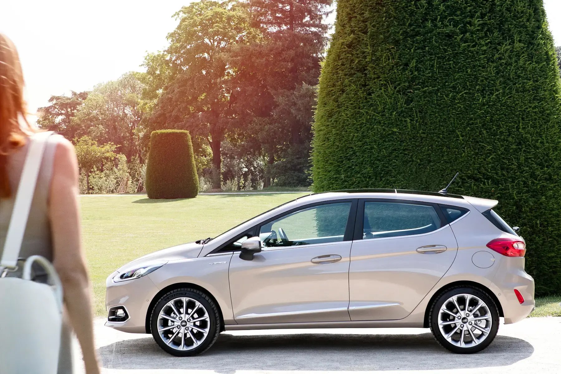 white-Ford-Fiesta-side-parked