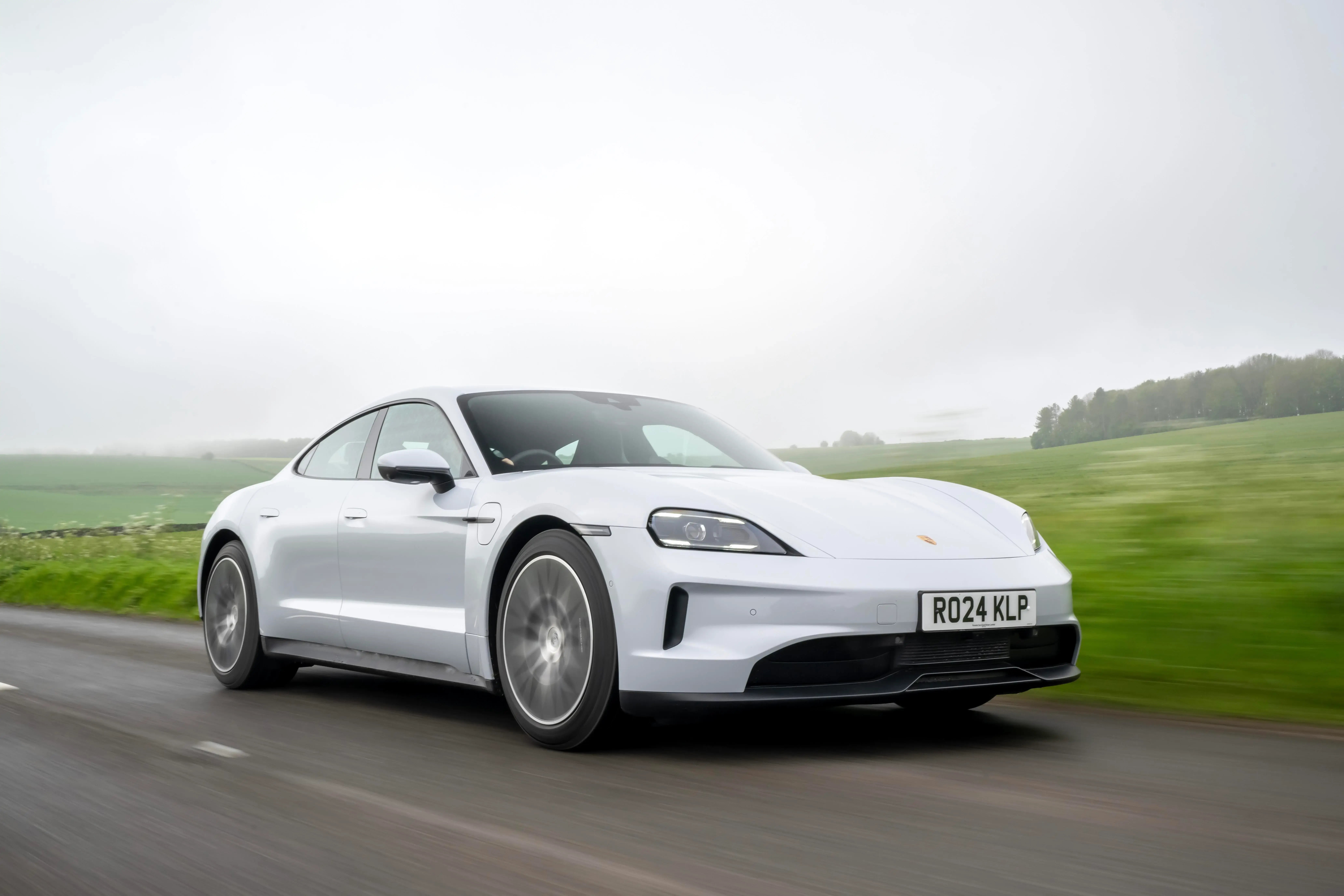 white-Porsche-Taycan-dynamic-low-angle