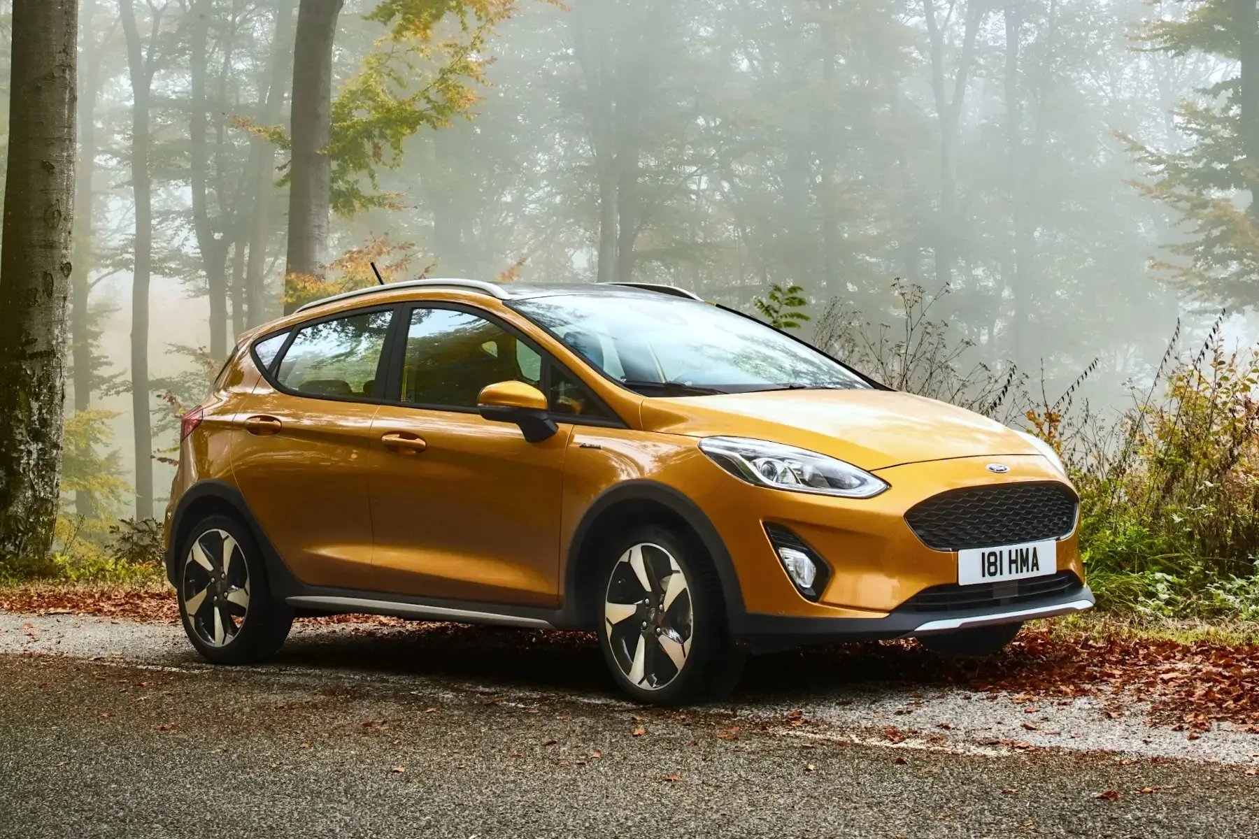 yellow-Ford-Fiesta-parked